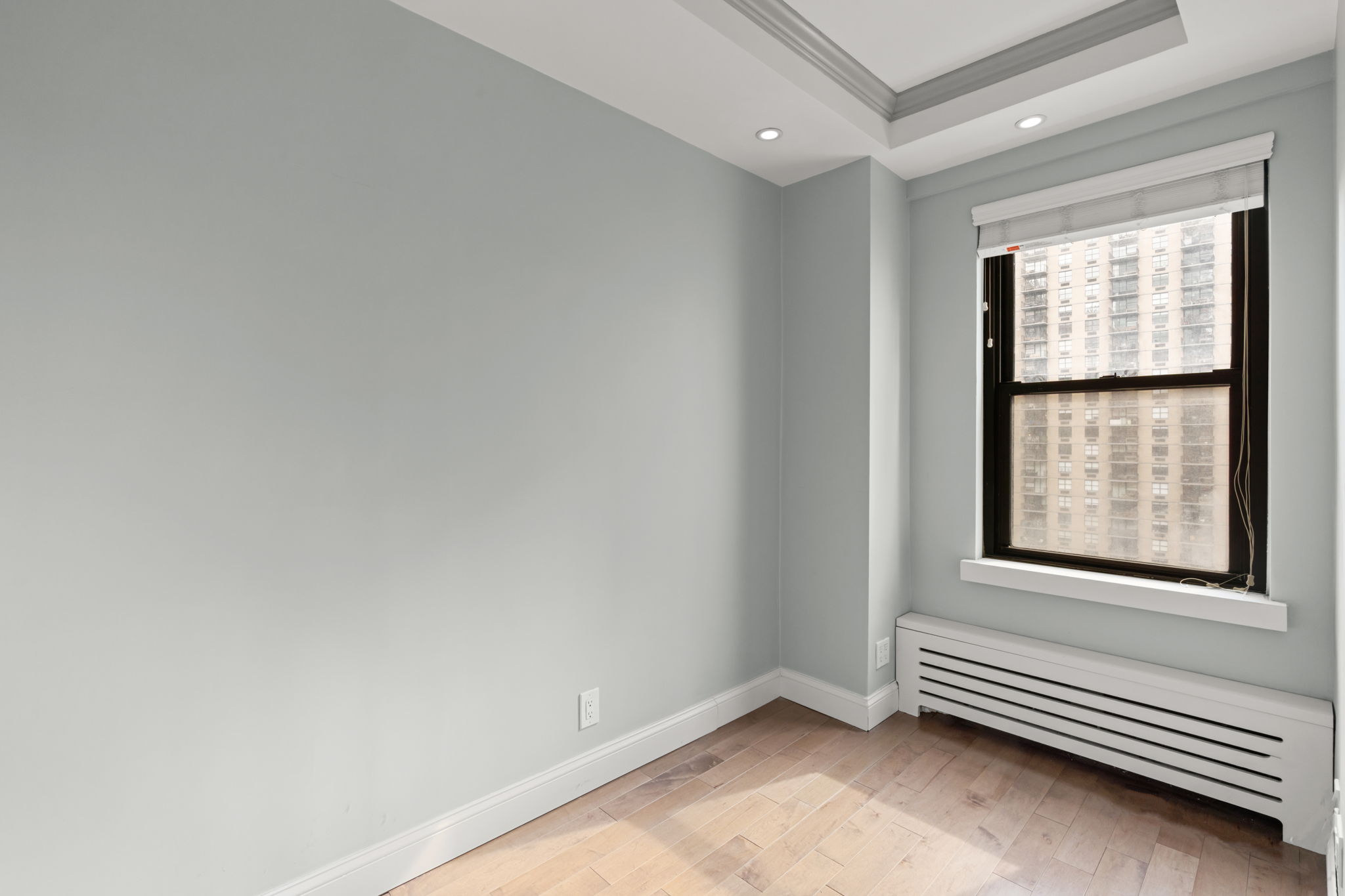 2 Tudor City Place, Unit 6JOS Manhattan, NY 10017 - Photo 11 of 16 an empty room with windows