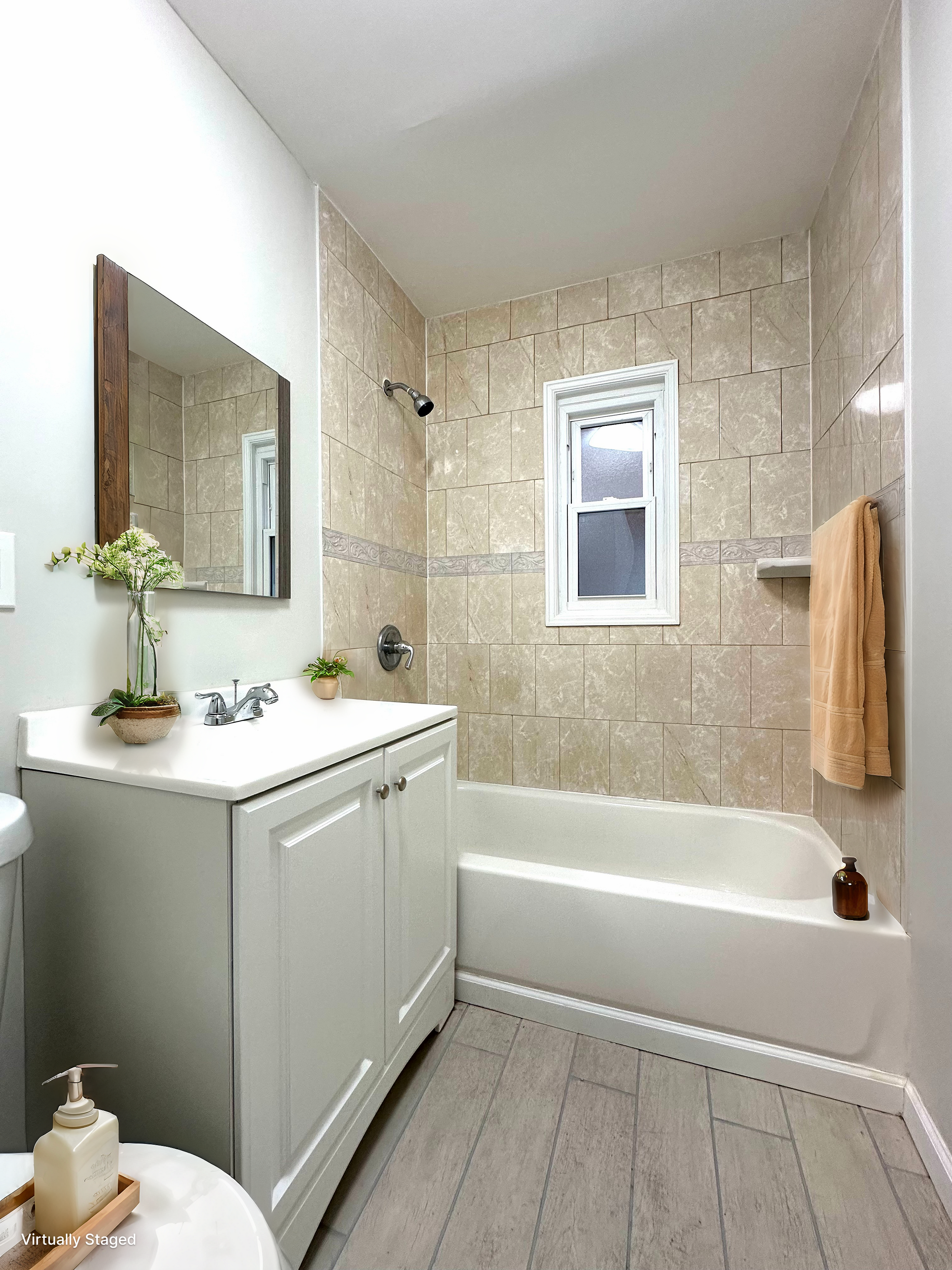 75-66 197th Street Queens, NY 11366 - Photo 6 of 14 a bathroom with a sink mirror toilet and bathtub