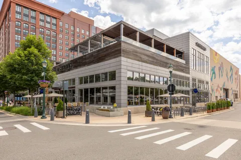 a view of street with large building