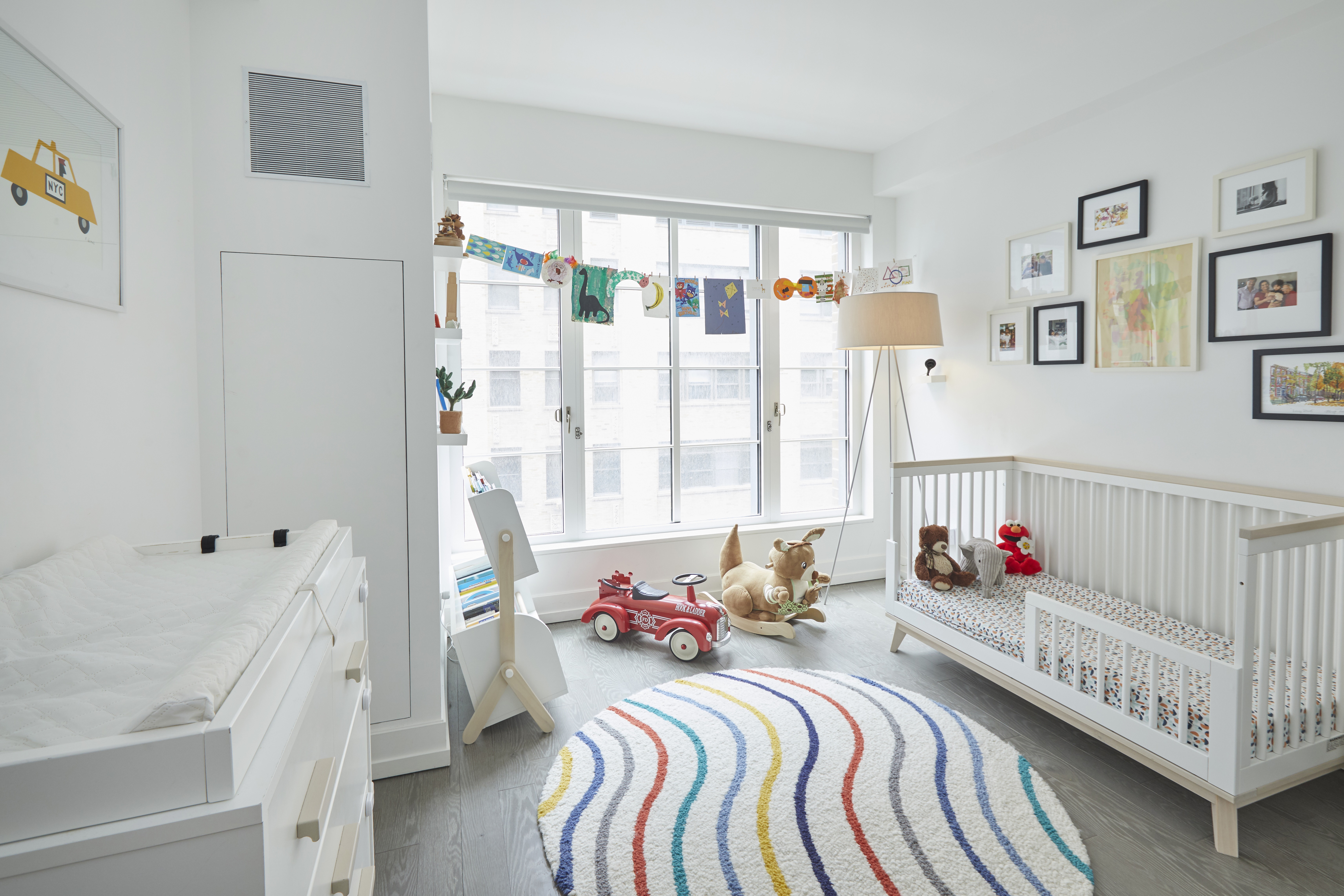 70 Charlton Street, Unit 7E Manhattan, NY 10014 - Photo 4 of 17 a bedroom with furniture and a bed