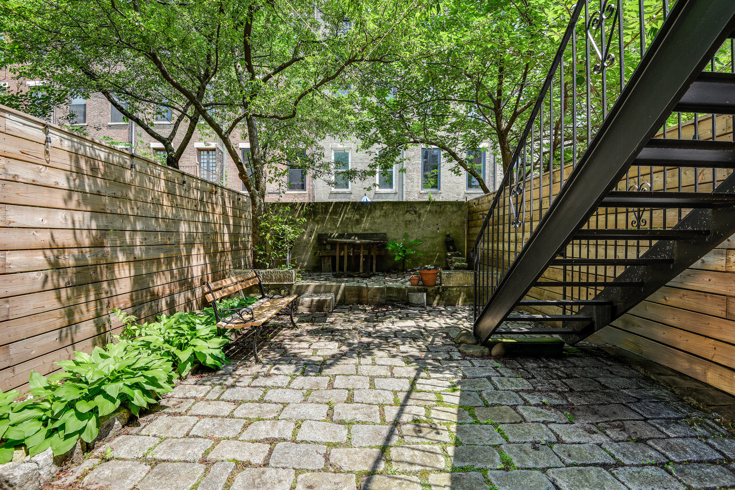 347 West 121st Street Manhattan, NY 10027 - Photo 14 of 16 a view of backyard with a patio