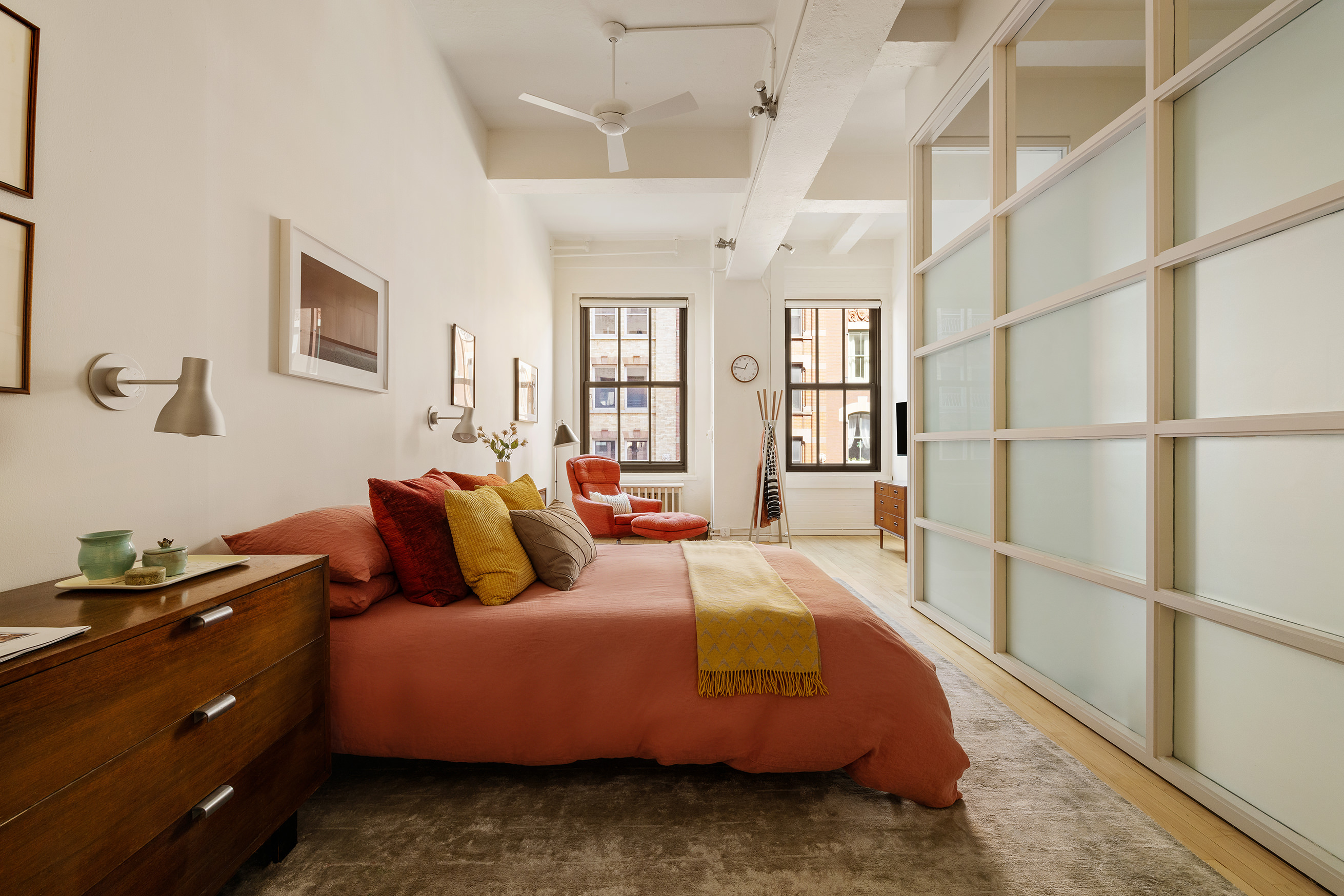 20 Jay Street, Unit 2/3C Manhattan, NY 10013 - Photo 7 of 16 a bedroom with a bed and wooden floor