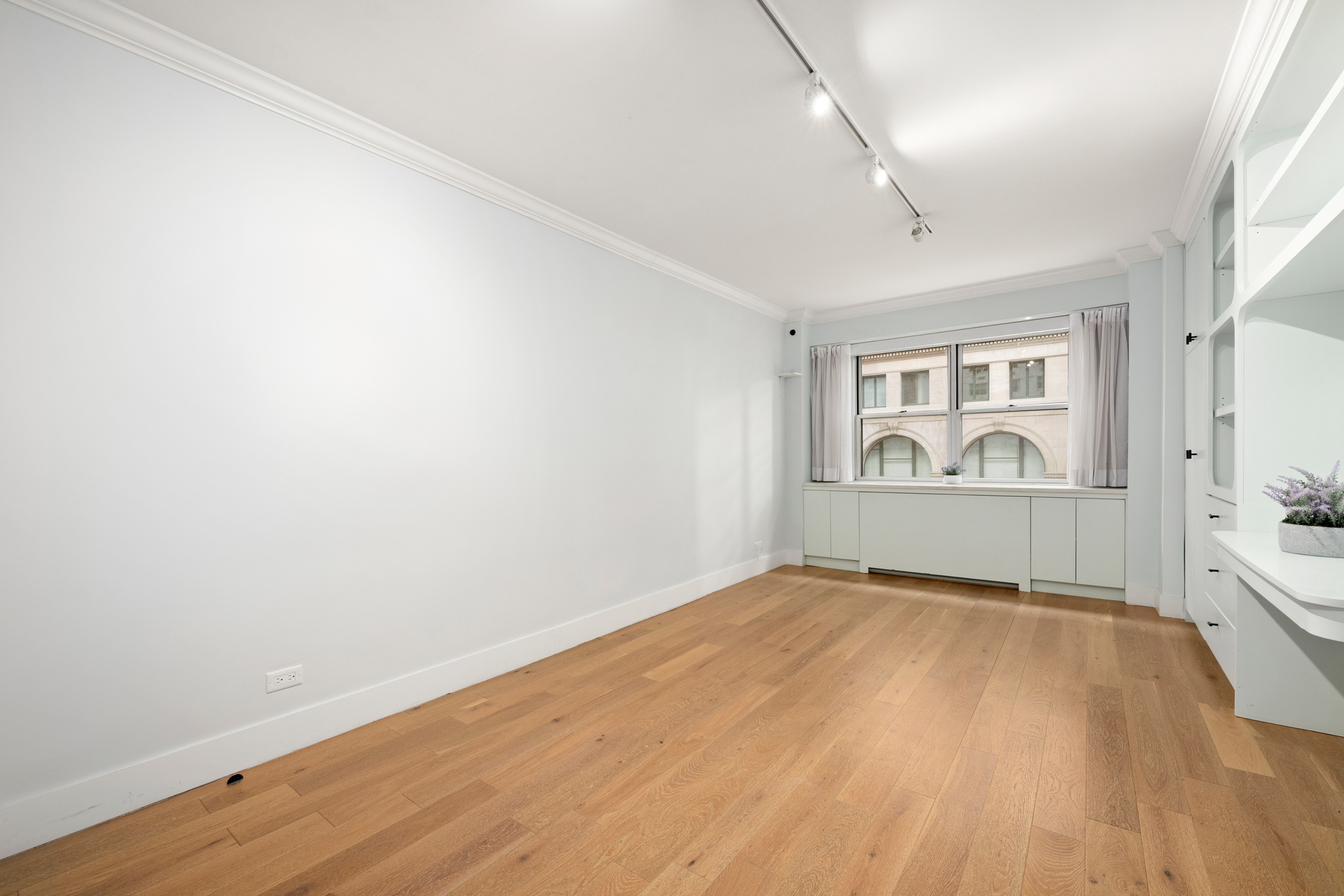 70 East 10th Street, Unit 4V Manhattan, NY 10003 - Photo 13 of 26 a view of an empty room and window