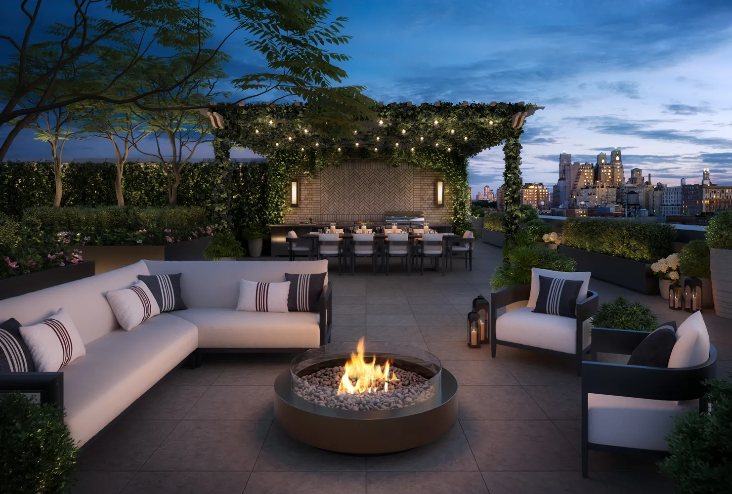 a view of a patio with couches and a fire pit and a fire pit with the couches near an umbrella