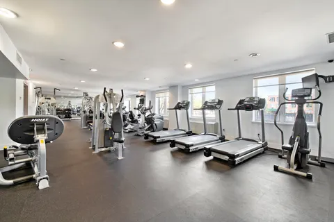 a view of a room with gym equipment