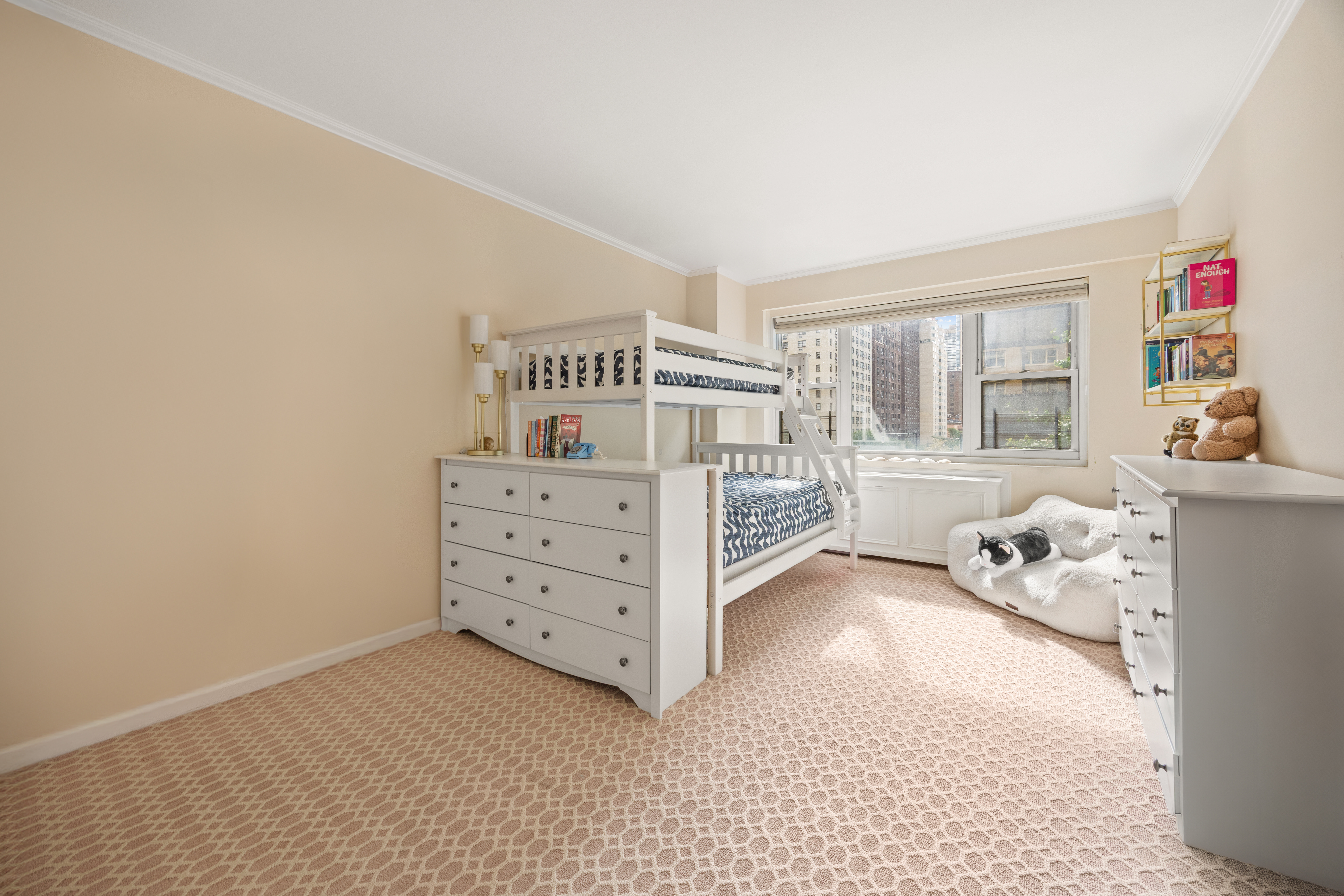 345 East 56th Street, Unit 3F Manhattan, NY 10022 - Photo 7 of 10 a view of a bedroom with furniture and windows