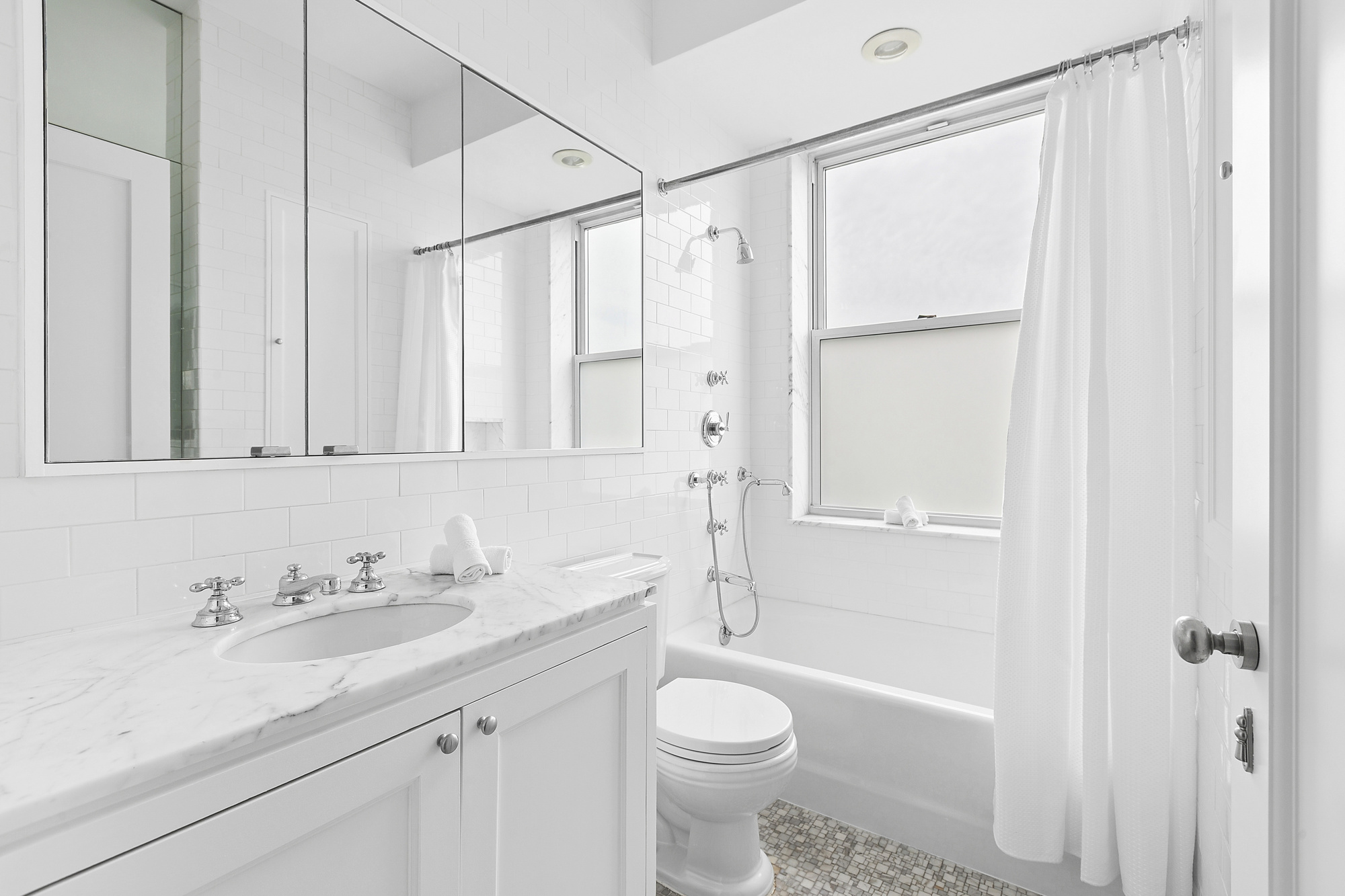 325 Riverside Drive, Unit 111 Manhattan, NY 10025 - Photo 10 of 13 a bathroom with a sink a toilet and a bathtub