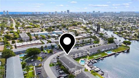 a kitchen with stainless steel appliances granite countertop a stove microwave and cabinets