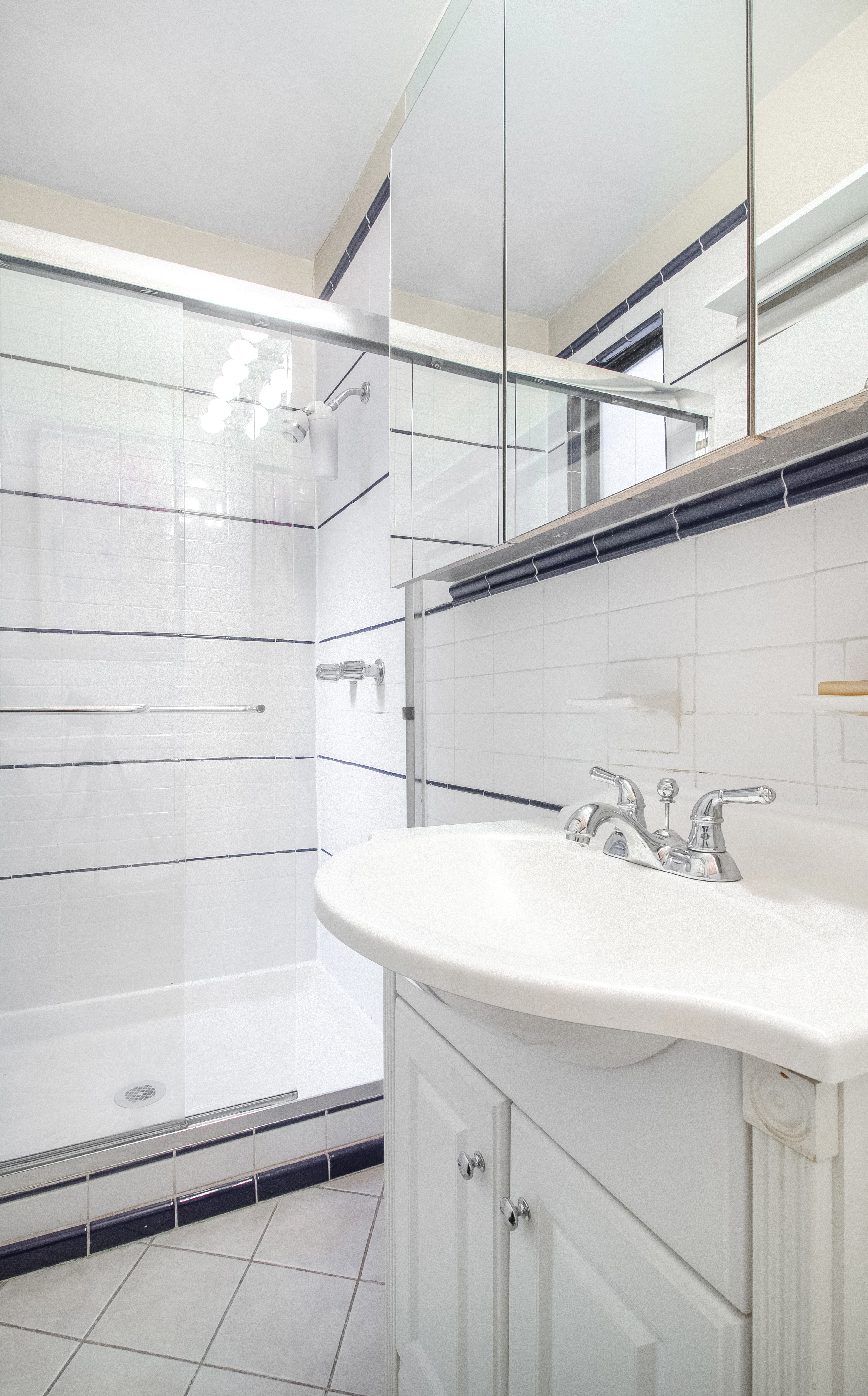 246 East 90th Street, Unit 5C Manhattan, NY 10128 - Photo 12 of 13 a bathroom with a sink and a bathtub