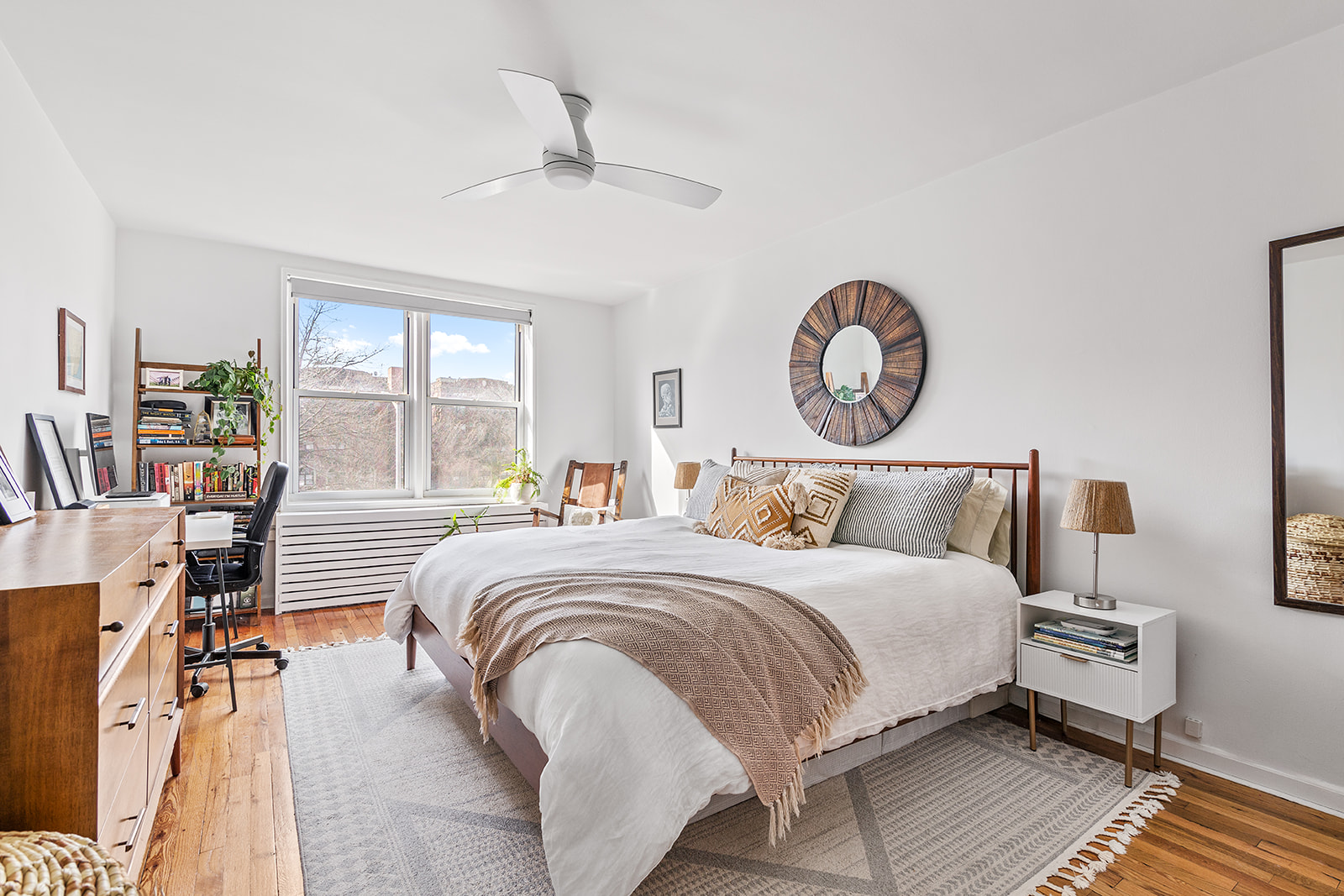 525 Ocean Parkway, Unit 2B Brooklyn, NY 11218 - Photo 6 of 12 a bedroom with bed and a large window