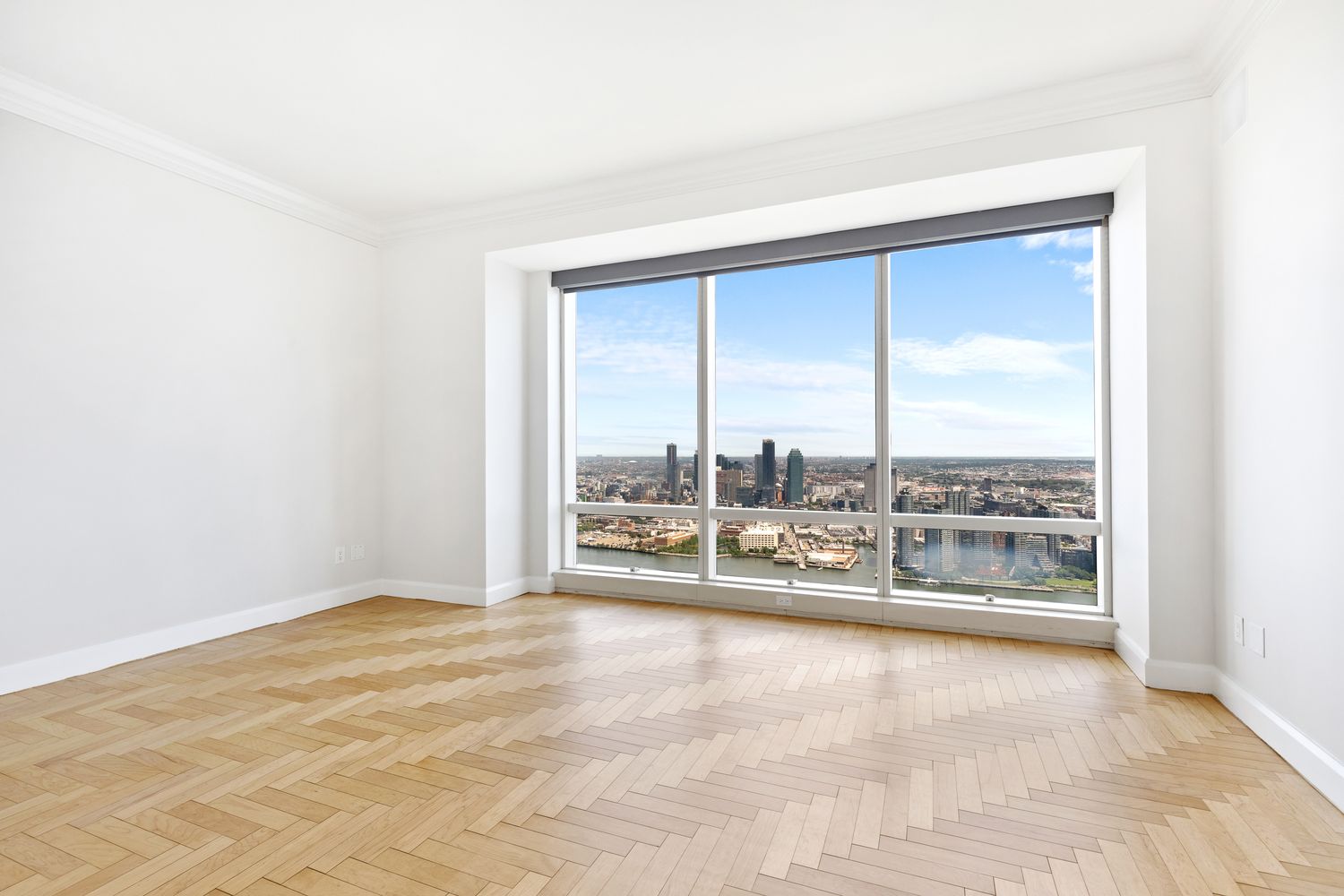845 United Nations Plaza, Unit 63B Manhattan, NY 10017 - Photo 8 of 14 a view of a room with a large window