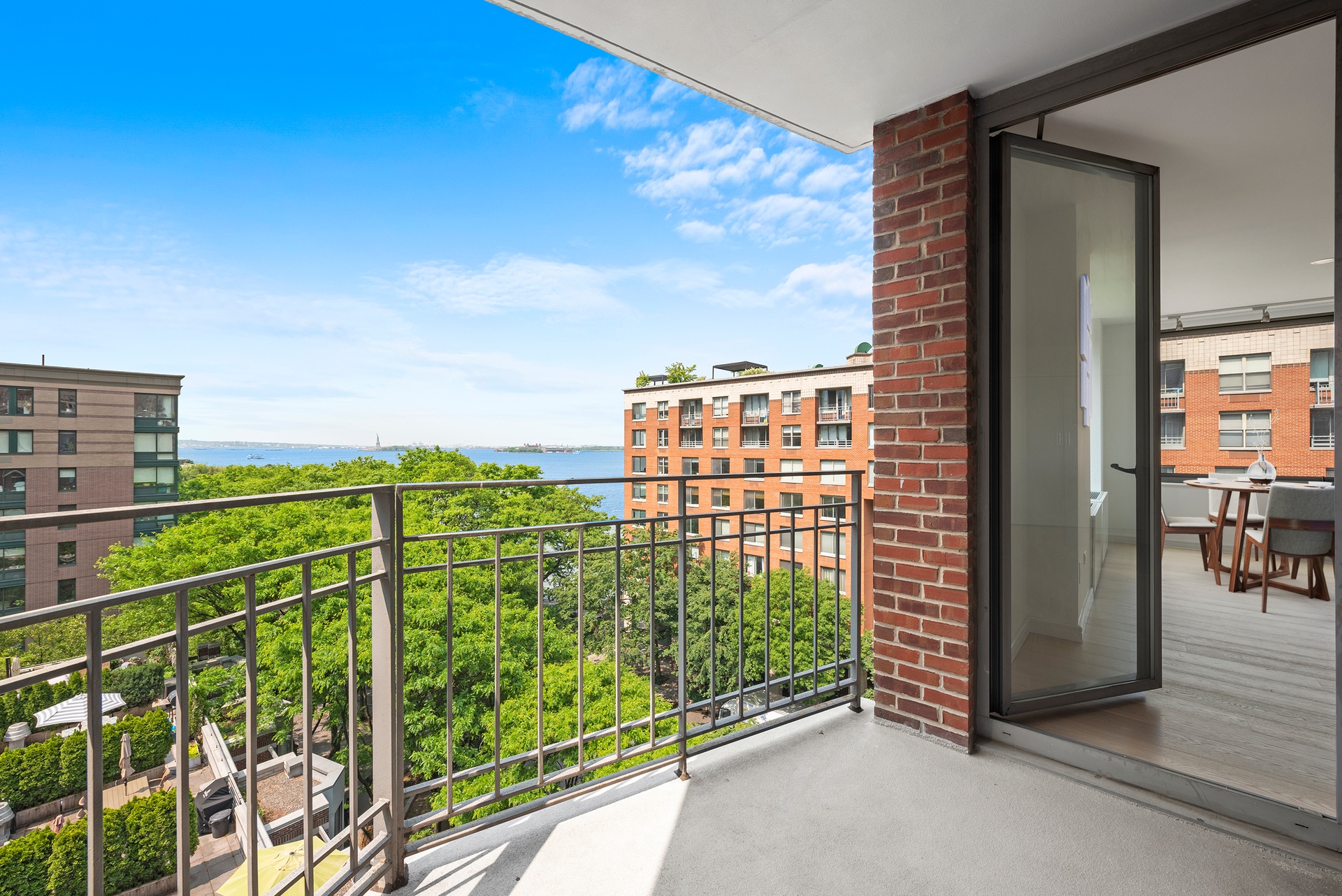 a view of a balcony with city view