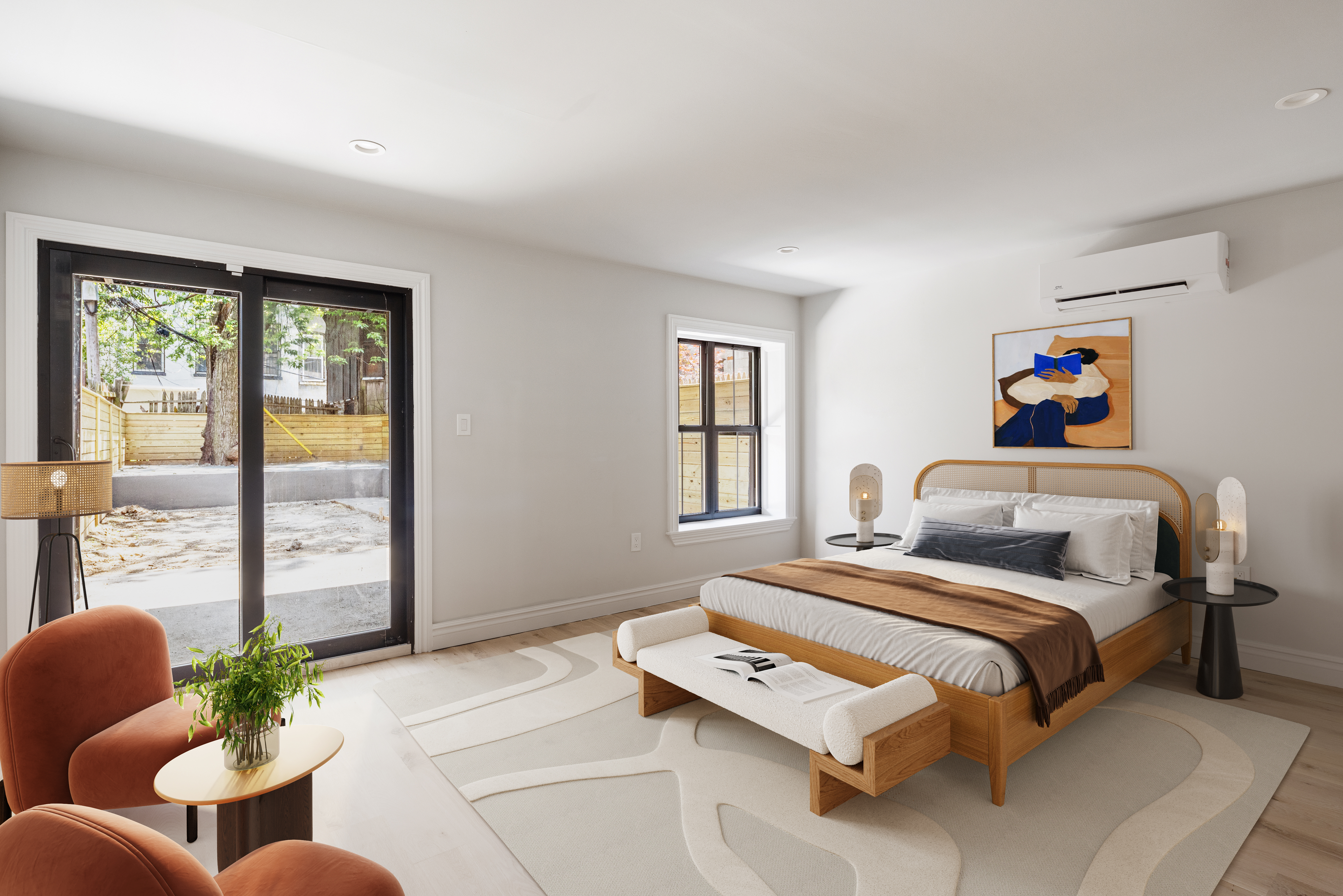 698 Macon Street Brooklyn, NY 11233 - Photo 7 of 17 a bedroom with a bed and large windows