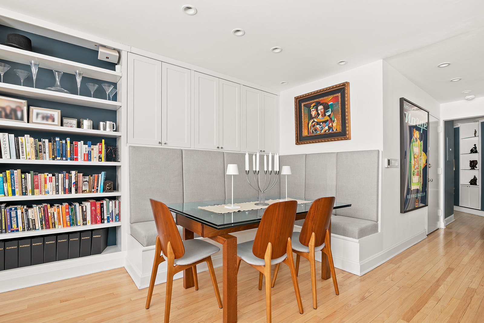 24 West 70th Street, Unit 1 Manhattan, NY 10023 - Photo 6 of 11 a view of a livingroom with furniture and bookshelf