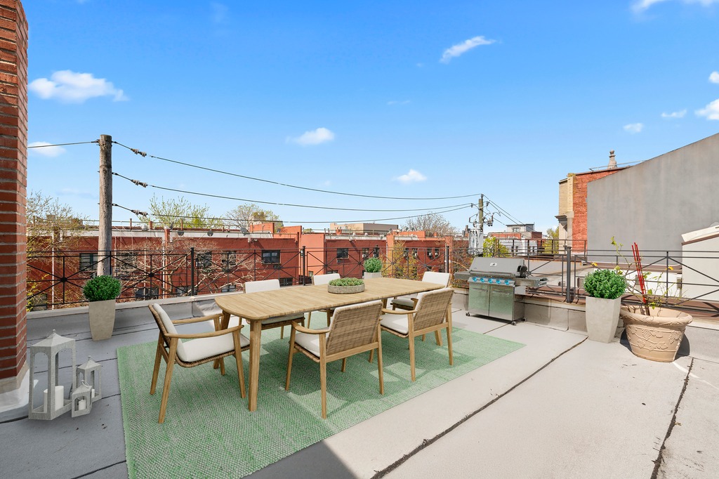 82 Visitation Place, Unit 2 Brooklyn, NY 11231 - Photo 10 of 12 a view of a patio with a dining table and chairs