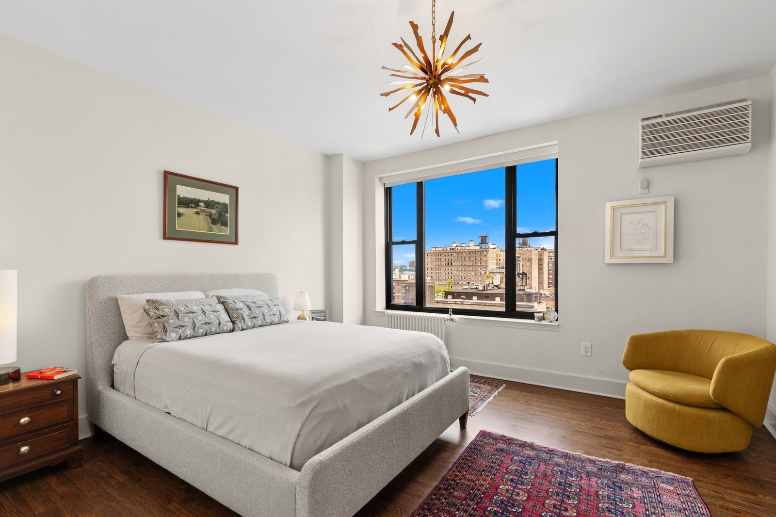 309 West 86th Street, Unit 11B Manhattan, NY 10024 - Photo 7 of 13 a bedroom with a bed and a couch