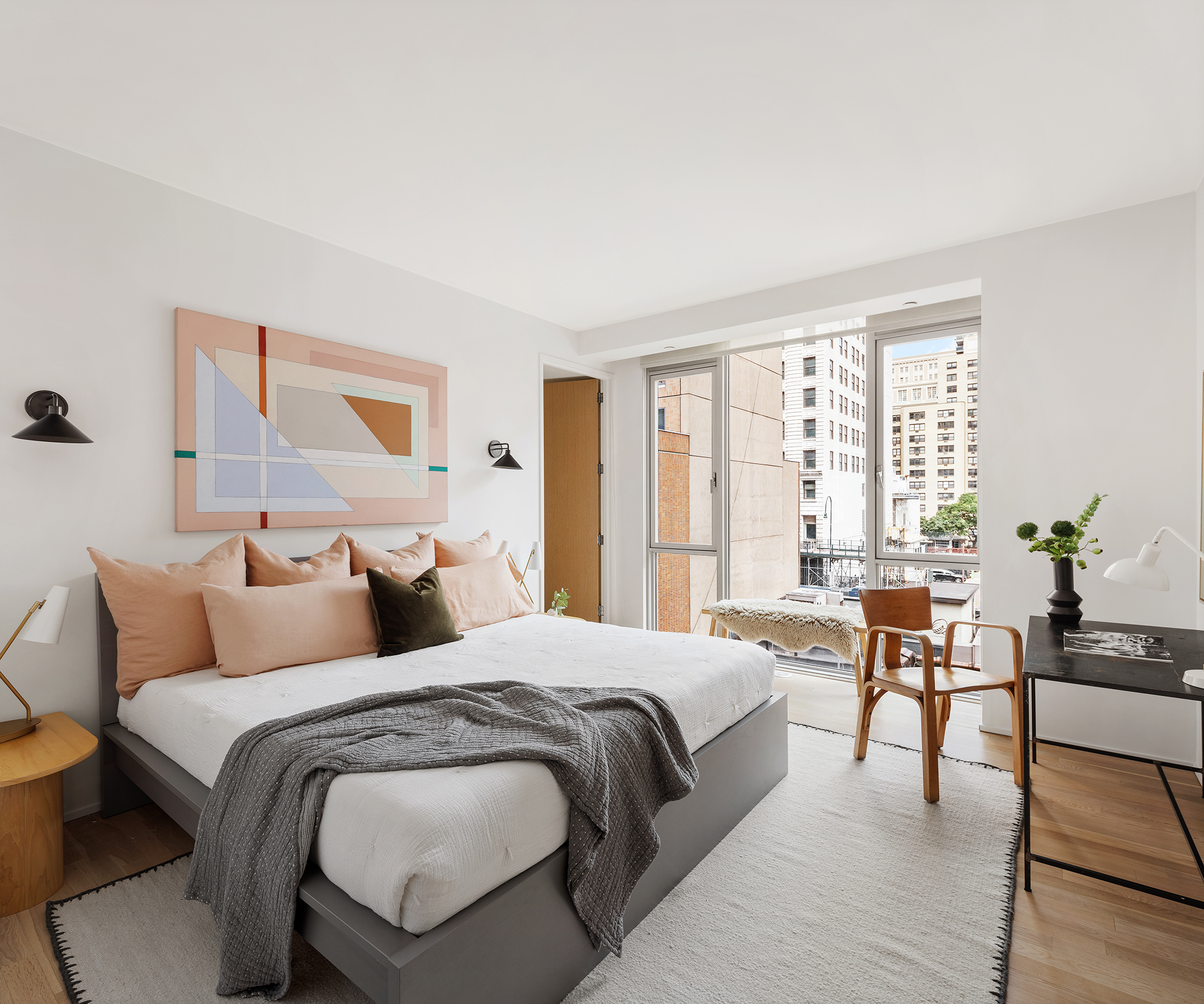 110 3rd Avenue, Unit 4B Manhattan, NY 10003 - Photo 6 of 15 a bedroom with two beds and a potted plant