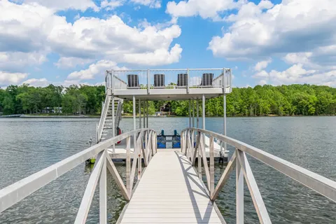 a view of a lake with a deck