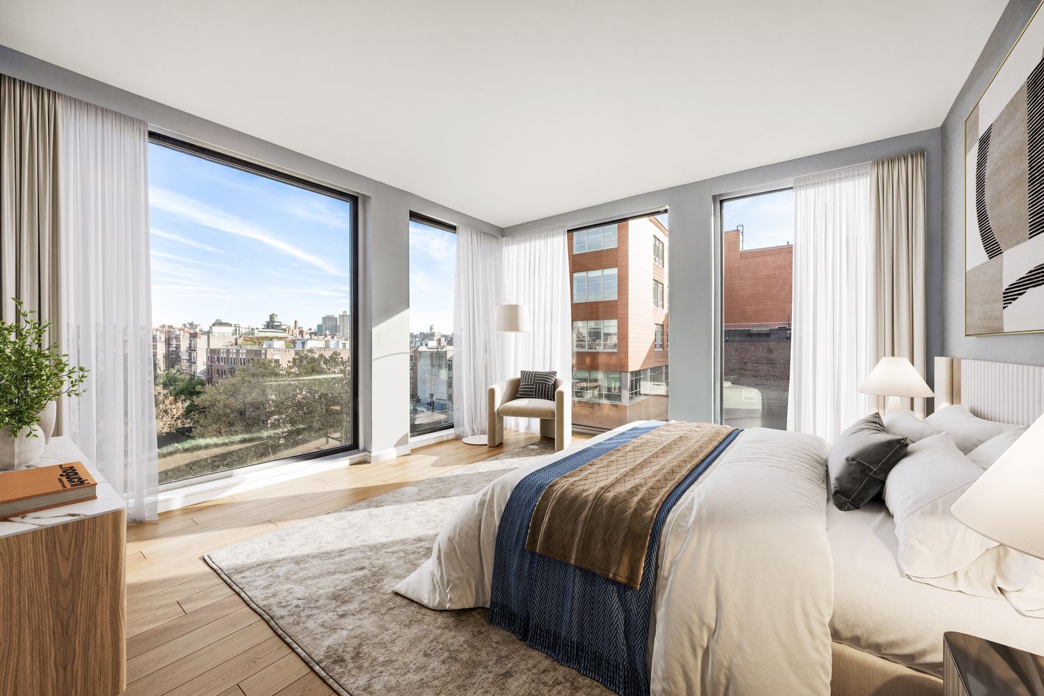 a bedroom with a large bed and a large window with outer view