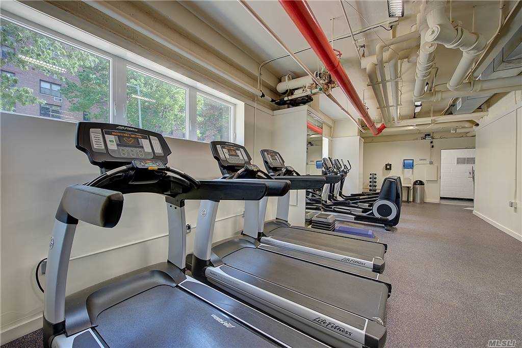 102-10 66th Road, Unit K25 Queens, NY 11375 - Photo 13 of 19 a view of a room with gym equipment