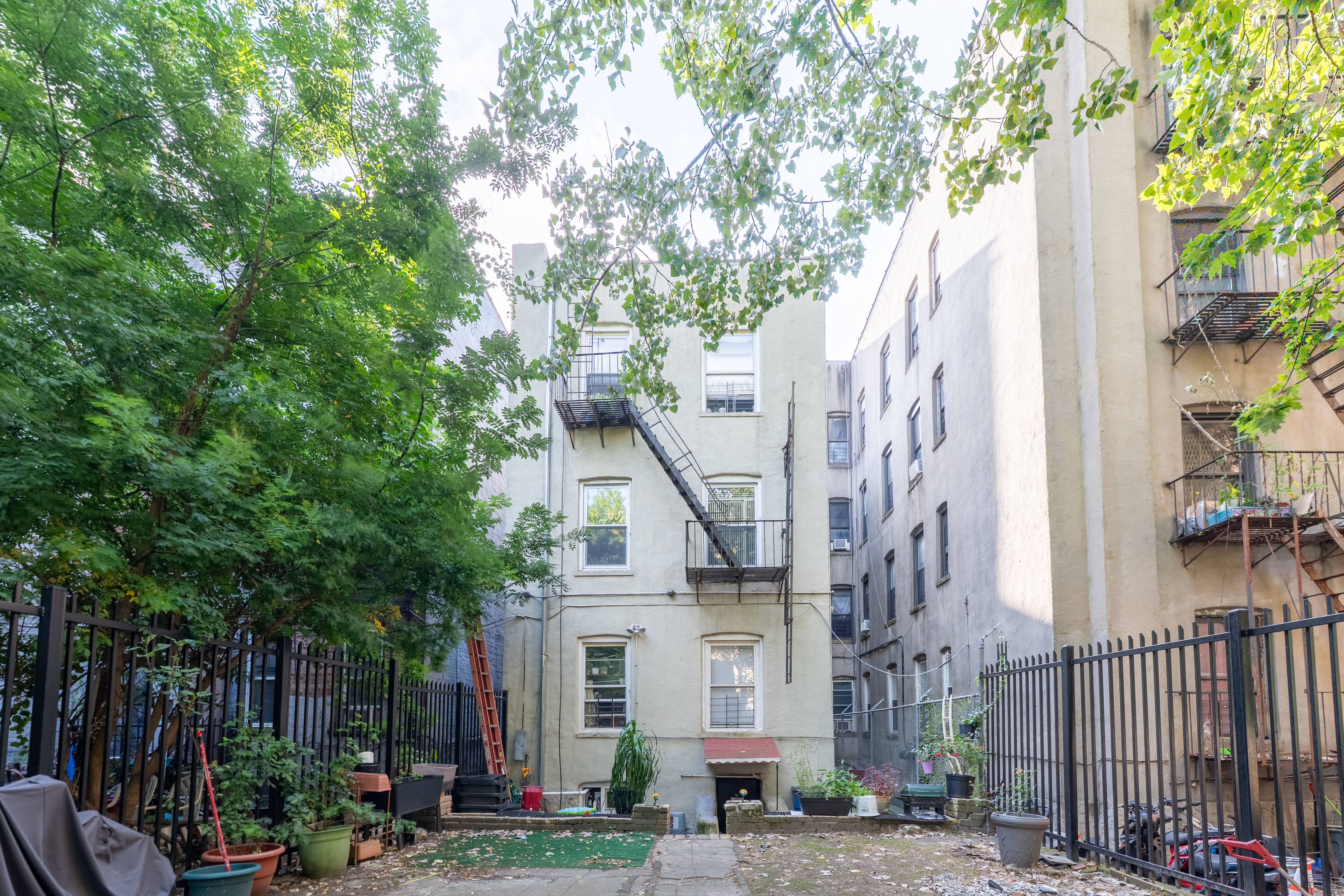2023 Hughes Avenue Bronx, NY 10457 - Photo 27 of 63 a view of multiple house with a street