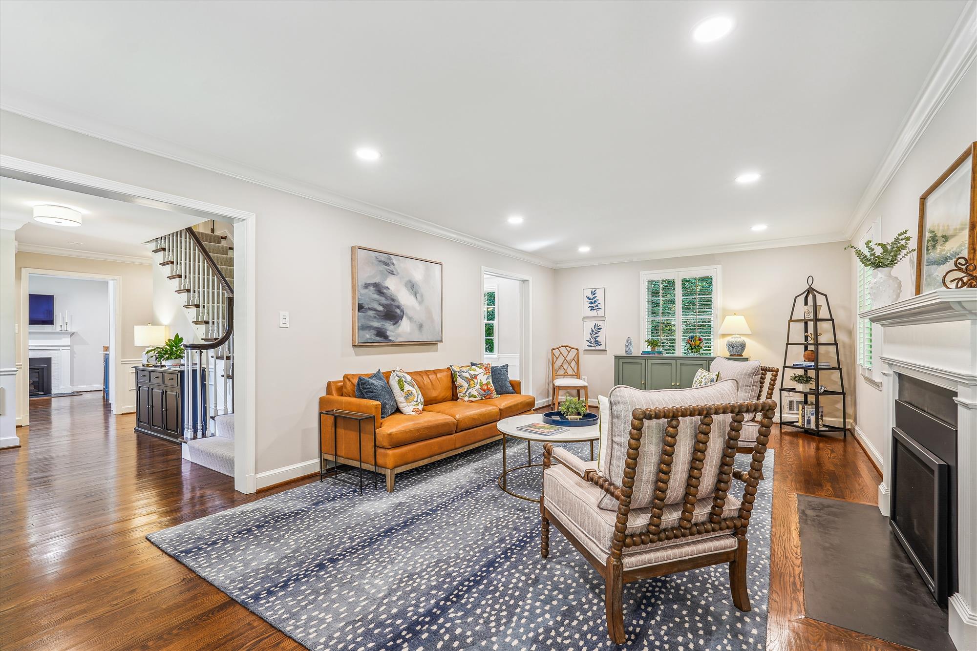 9904 Carter Road Bethesda, MD 20817 - Photo 5 of 41 a living room with fireplace furniture and a rug