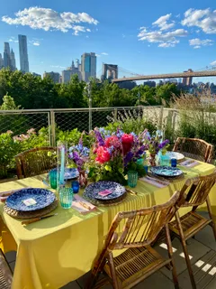a view of a chairs and table in a patio