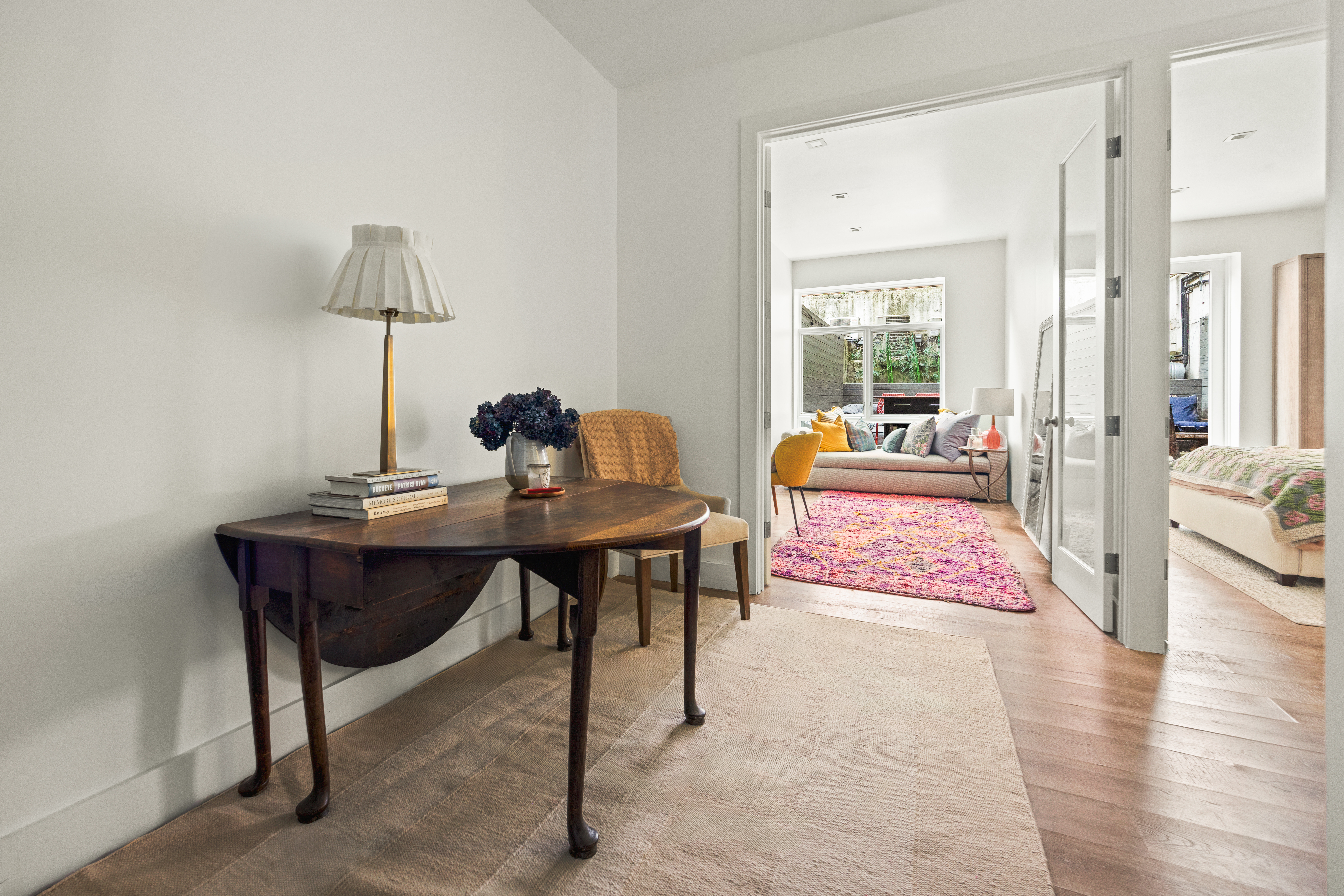 622 Grand Avenue, Unit 103 Brooklyn, NY 11238 - Photo 11 of 19 a living room with furniture and wooden floor
