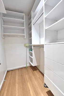 172 5th Avenue, Unit 2F Manhattan, NY 10010 - Photo 8 of 10 a view of walk in closet with empty racks