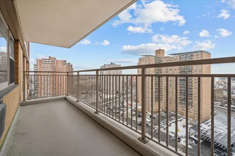 a view of balcony with furniture