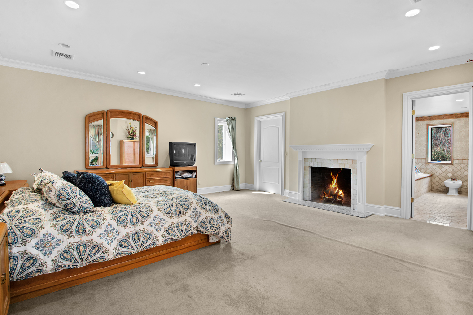 68 Circle Road Staten Island, NY 10304 - Photo 16 of 38 a living room with furniture and a fireplace