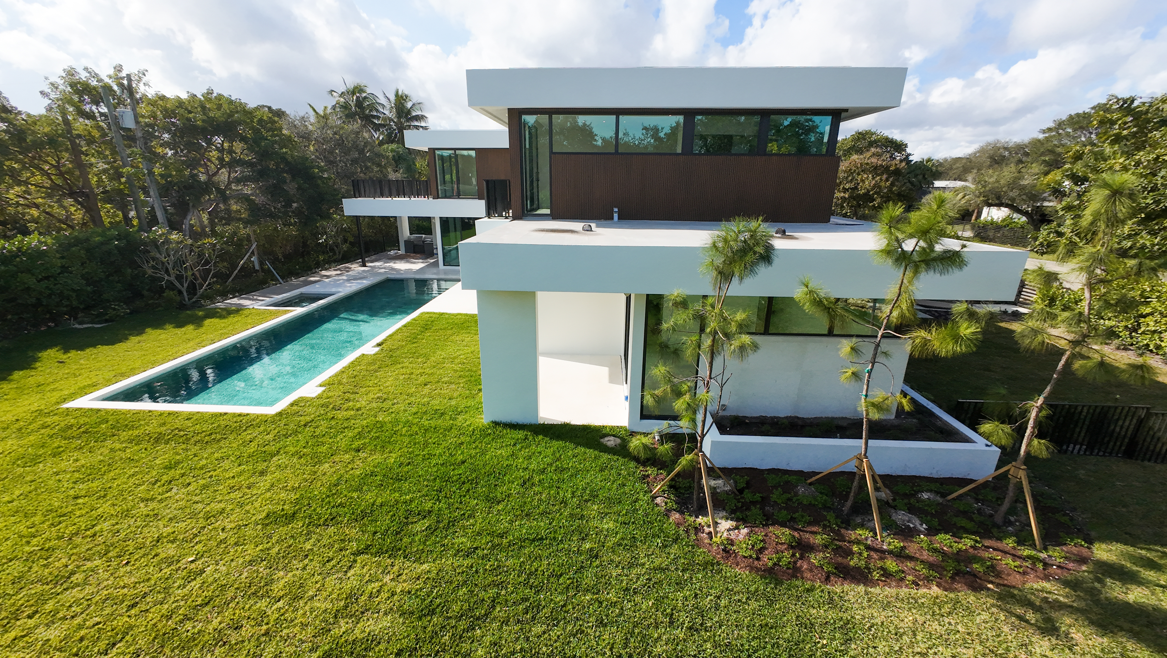 6920 Southwest 124th Street Pinecrest, FL 33156 - Photo 45 of 48 a swimming pool with outdoor seating and yard