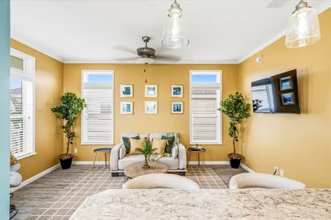a living room with furniture and a table