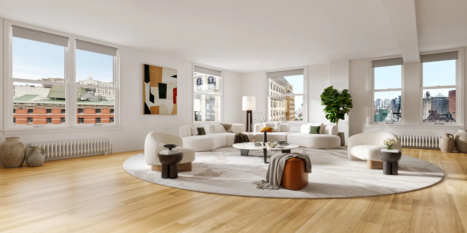 a living room with furniture large window and wooden floor