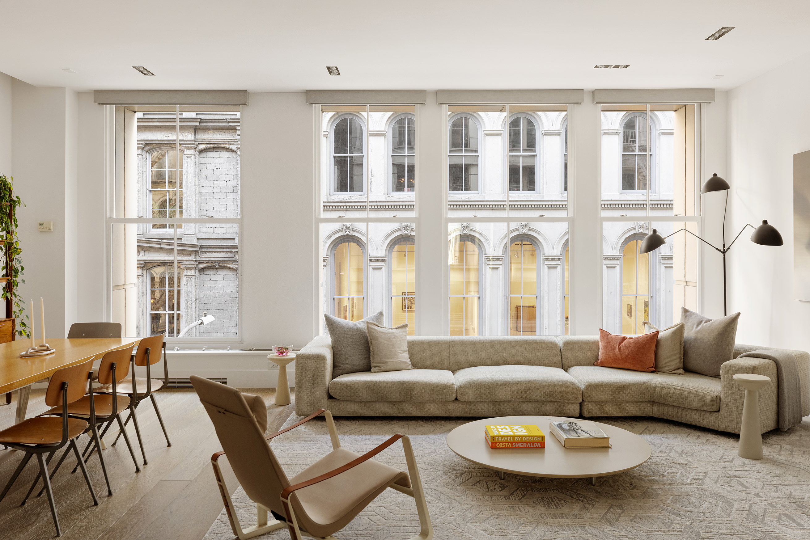 51 Walker Street, Unit 4B Manhattan, NY 10013 - Photo 10 of 13 a living room with furniture and a large window