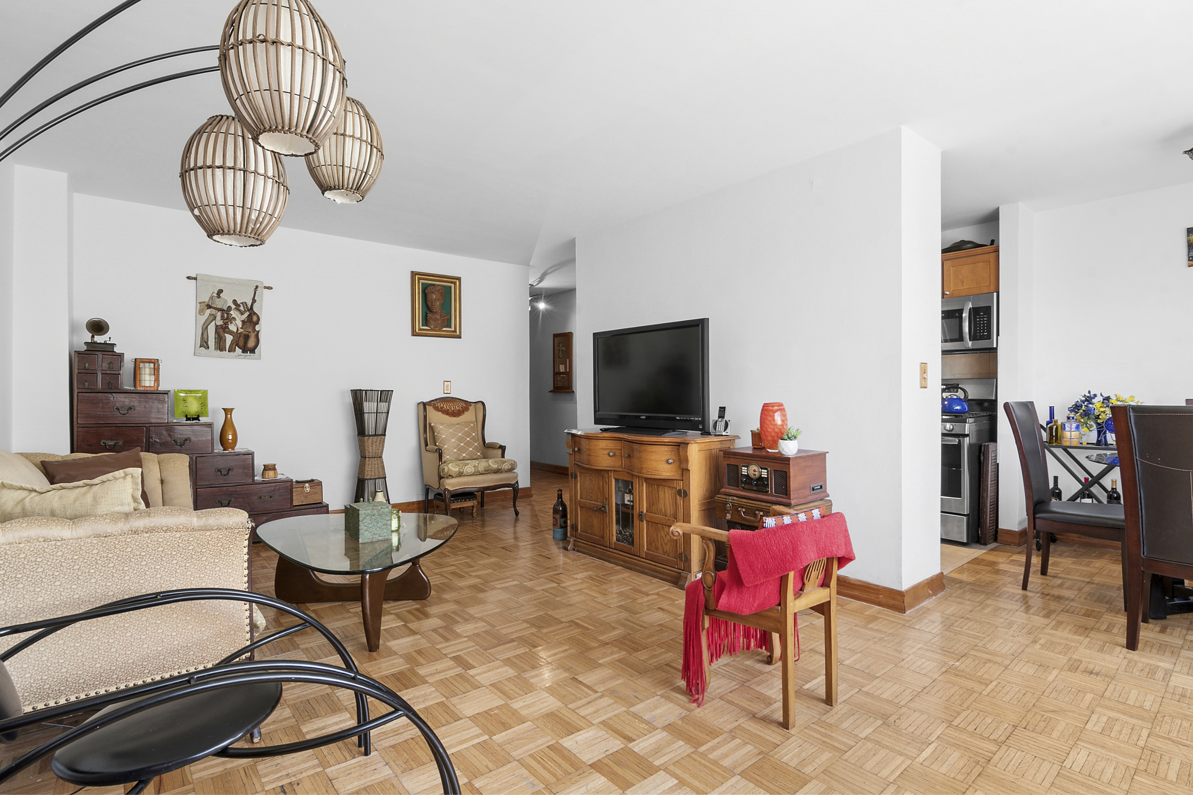 195 Willoughby Avenue, Unit 518 Brooklyn, NY 11205 - Photo 2 of 7 a view of a livingroom with furniture and a flat screen tv