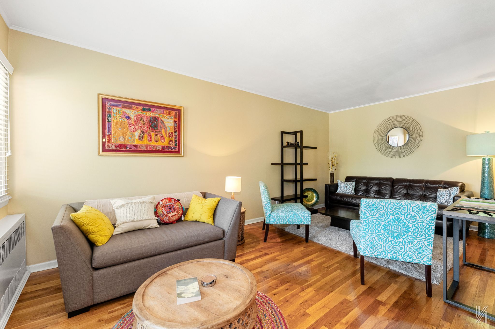 67-17 Eliot Avenue Queens, NY 11379 - Photo 3 of 21 a living room with furniture and wooden floor