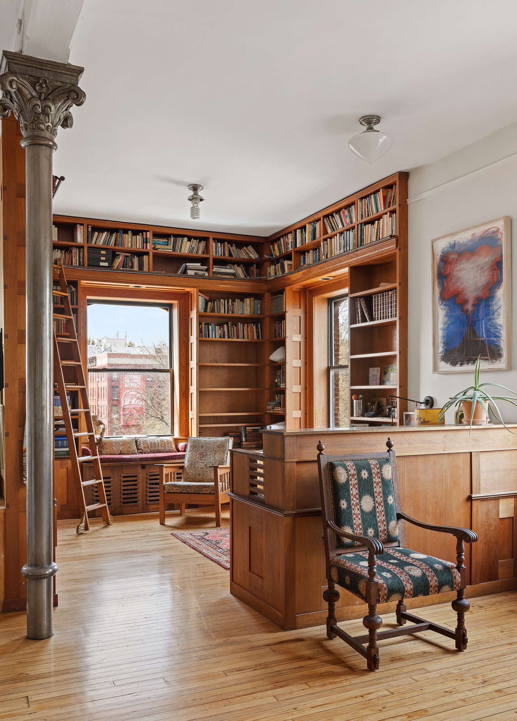 295 East 8th Street, Unit 3W Manhattan, NY 10009 - Photo 8 of 18 a living room with furniture and a window