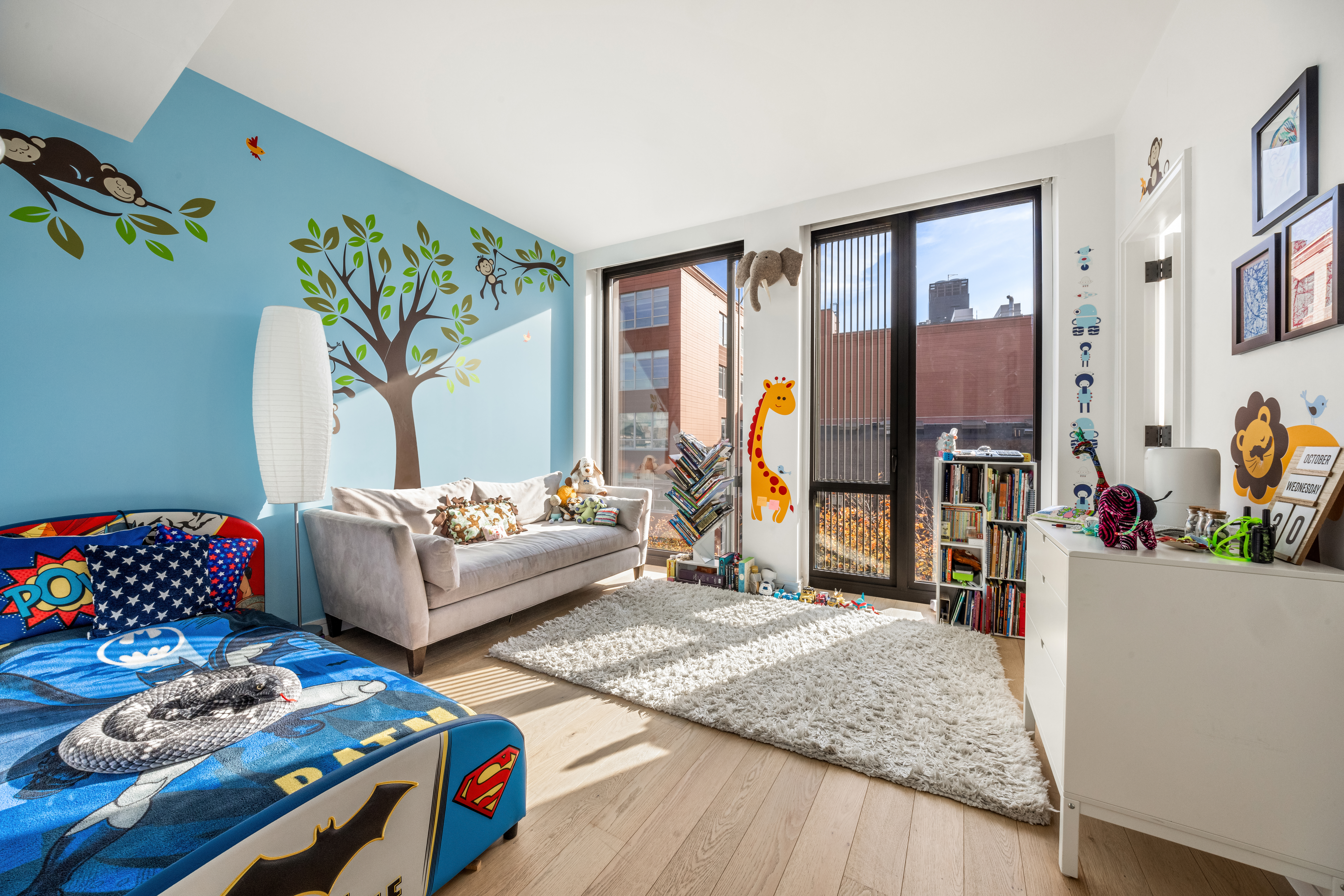 100 Barrow Street, Unit 7/8A Manhattan, NY 10014 - Photo 19 of 23 a living room with furniture and a window