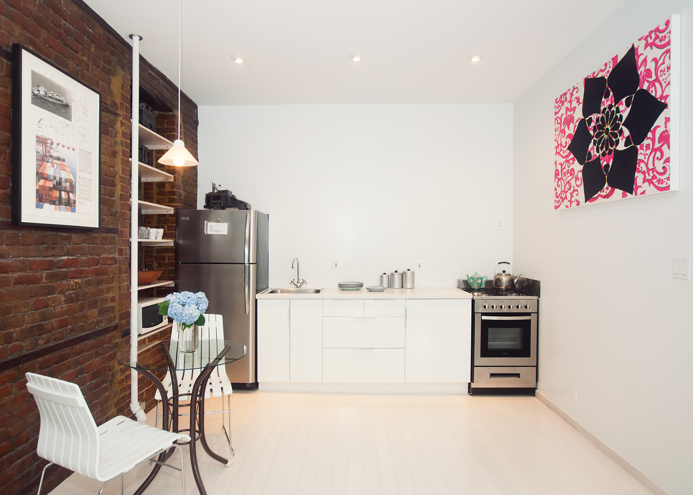 5-46 50th Avenue Queens, NY 11101 - Photo 13 of 17 a workspace with furniture and window