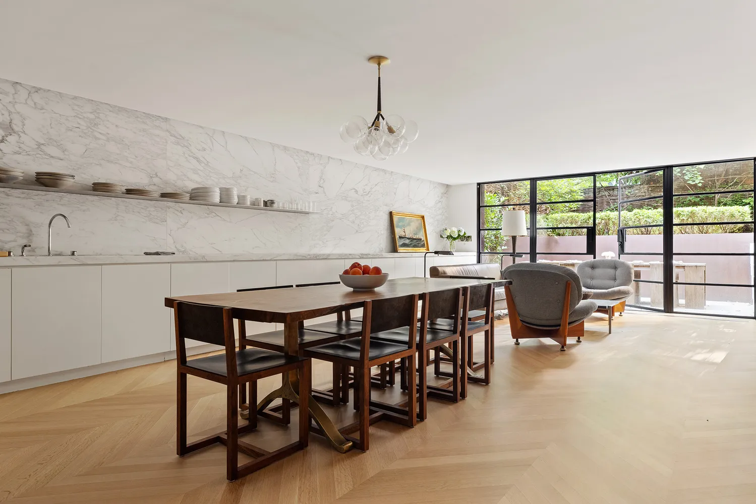 a view of a dining room with furniture window and outside view