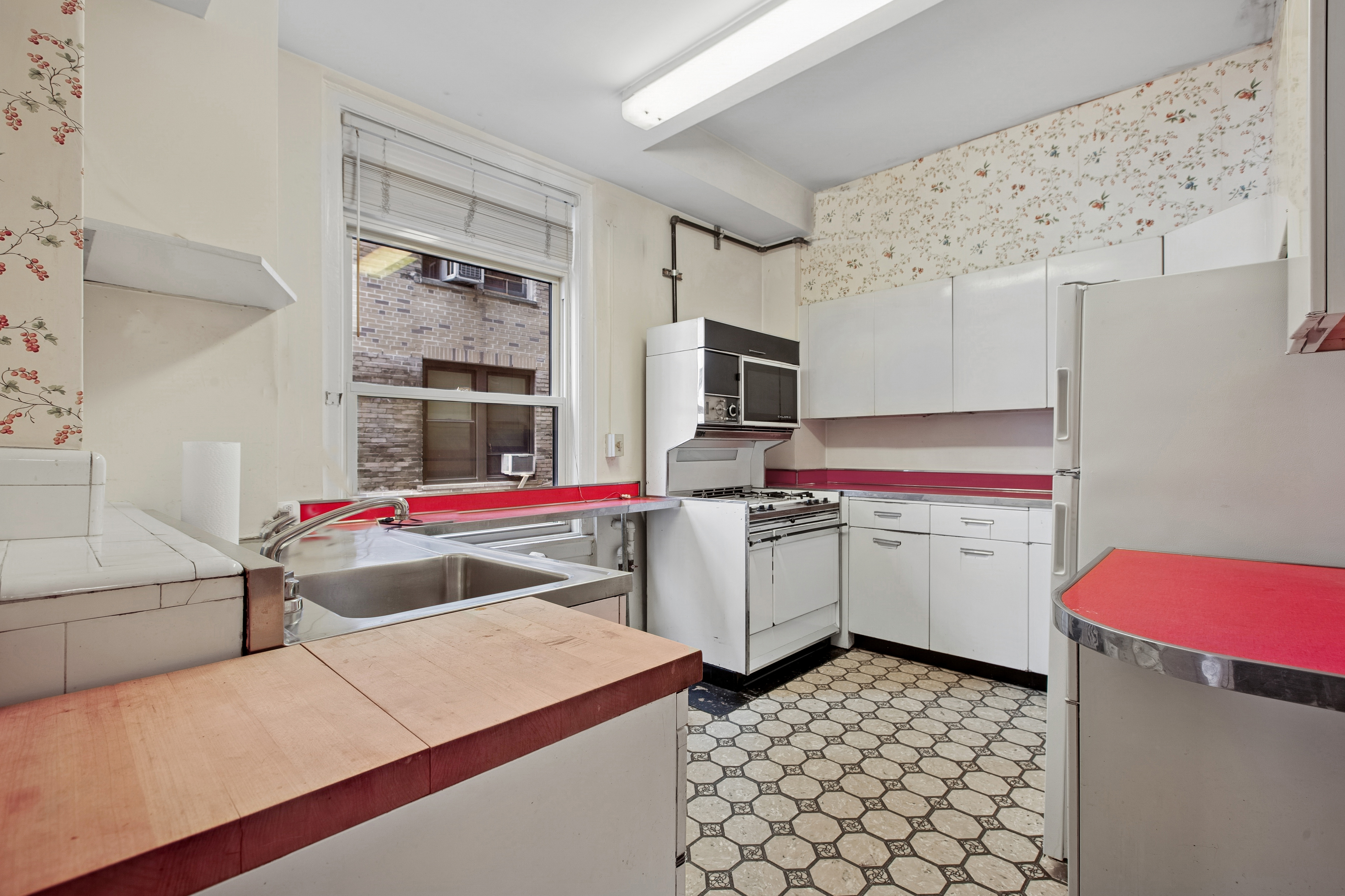 1170 5th Avenue, Unit 6A Manhattan, NY 10029 - Photo 13 of 17 a room with storage and utility