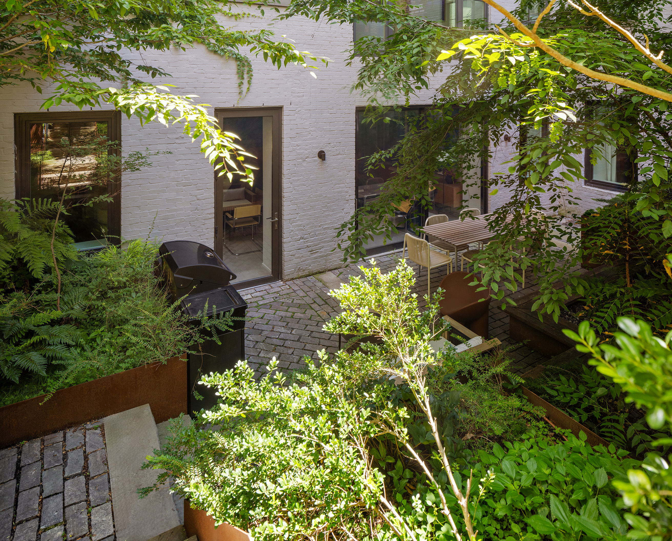 168 Plymouth Street, Unit GARDEN Brooklyn, NY 11201 - Photo 4 of 23 an aerial view of a house