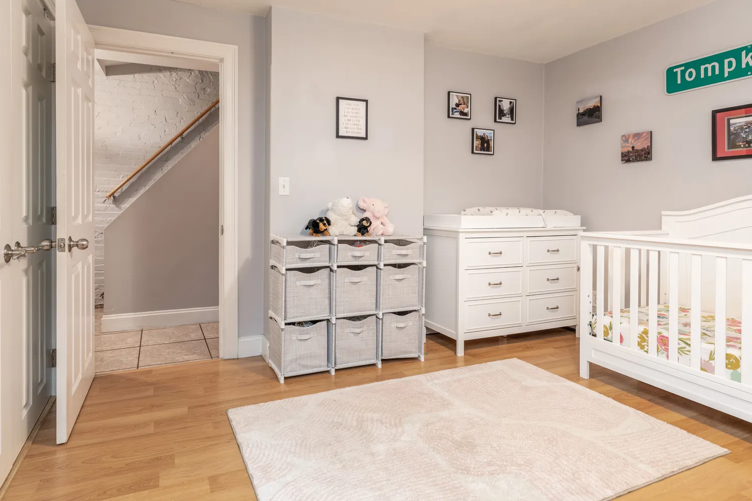 a view of a bedroom with furniture and window
