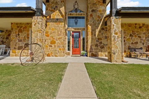 a house with trees in front of it