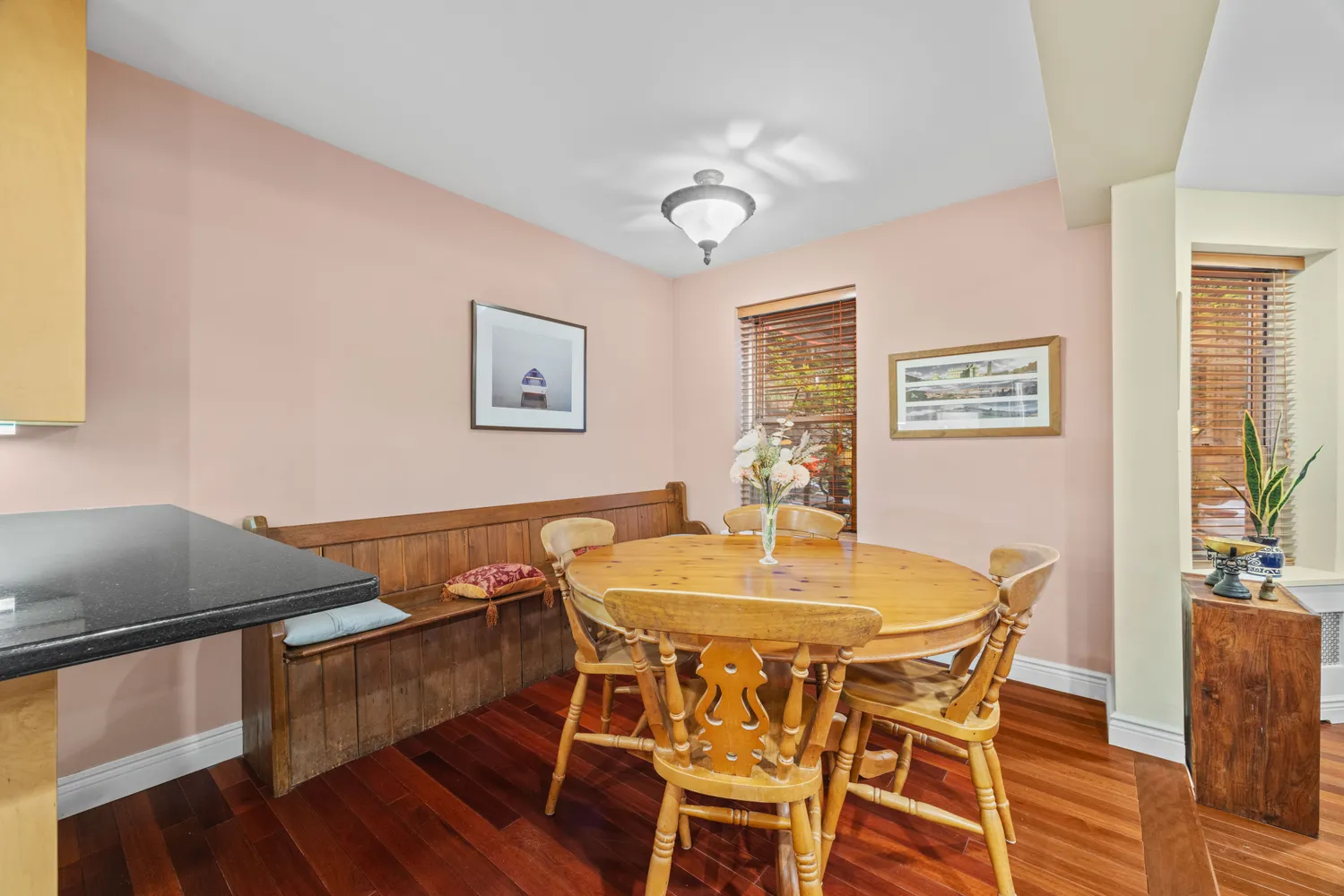 a dining room with furniture and window