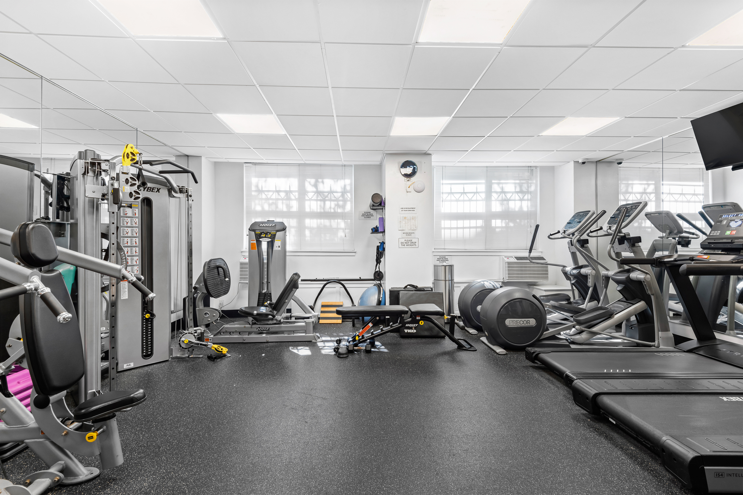 401 East 74th Street, Unit 1A Manhattan, NY 10021 - Photo 7 of 14 a view of a room with gym equipment