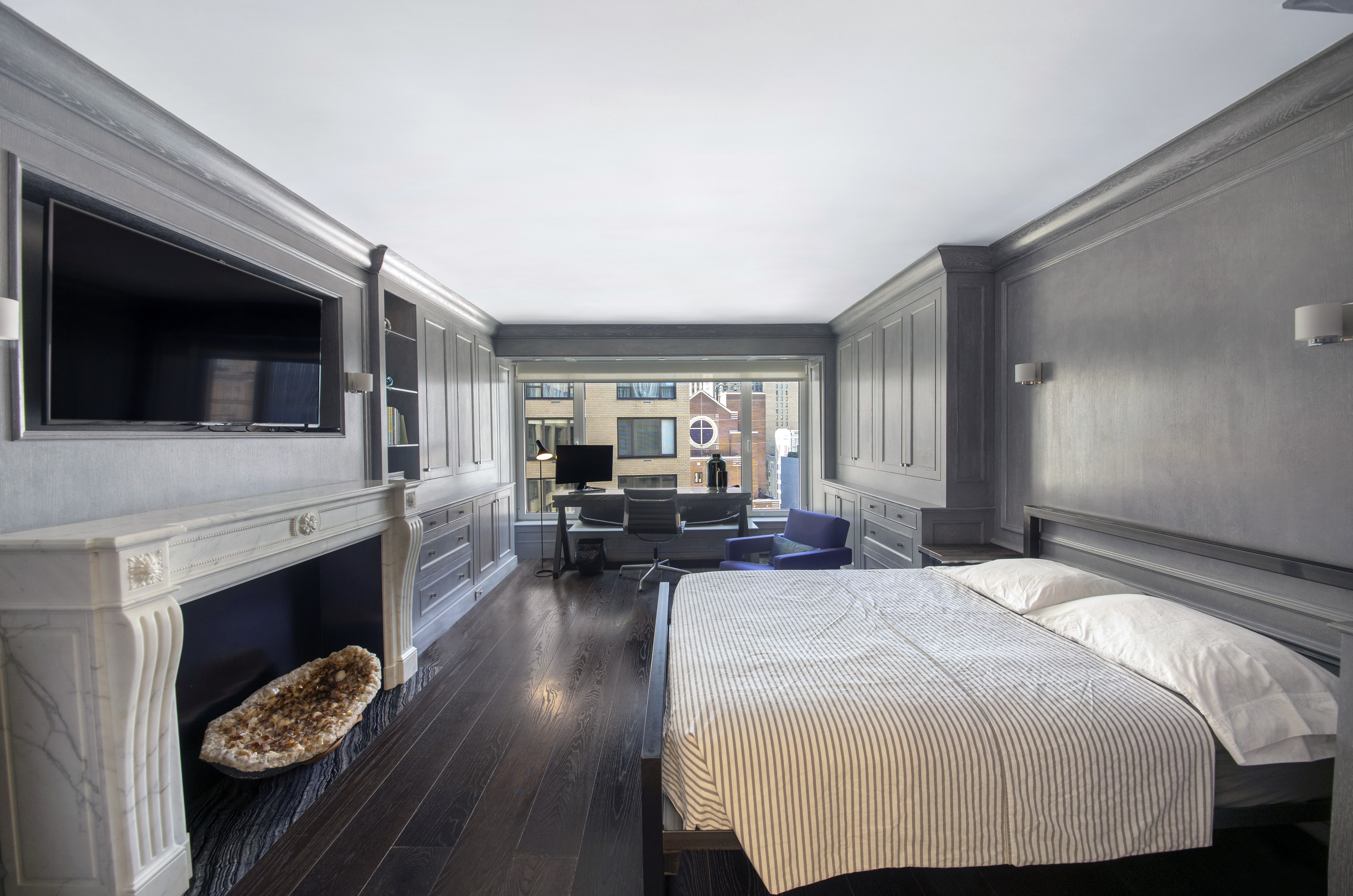 200 Central Park South, Unit 20DEF Manhattan, NY 10019 - Photo 11 of 16 a bedroom with a bed and a television