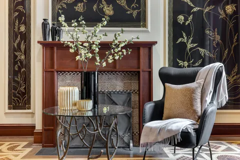 a view of a chairs and table in a patio