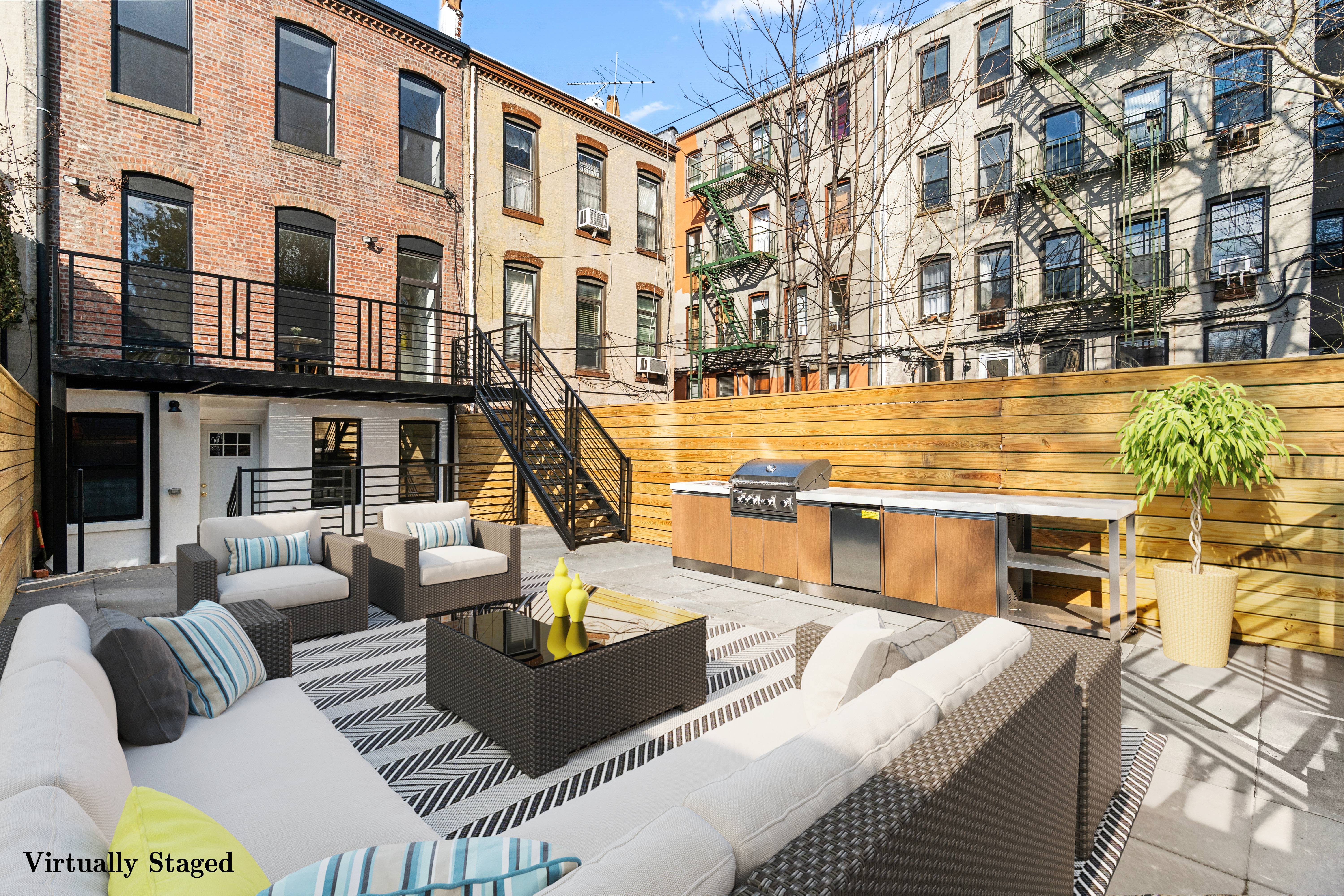 718 Sterling Place Brooklyn, NY 11216 - Photo 1 of 15 a view of a building from the roof